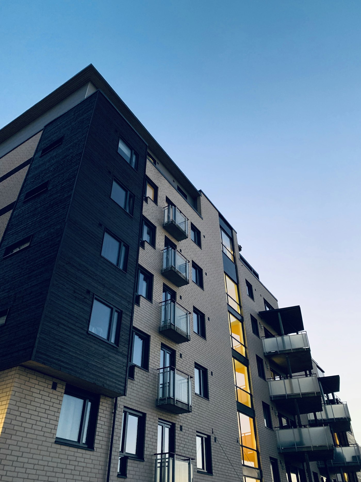 Modern residential tower in Buenos Aires at sunset